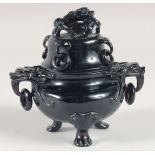 A FINE EARLY 20TH CENTURY CHINESE BAKELITE LIDDED CENSER, 12cm high.