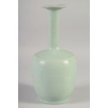 A CHINESE CELADON VASE, 26.5cm high.