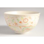 A CHINESE TRI-COLOUR BOWL, 12cm diameter.