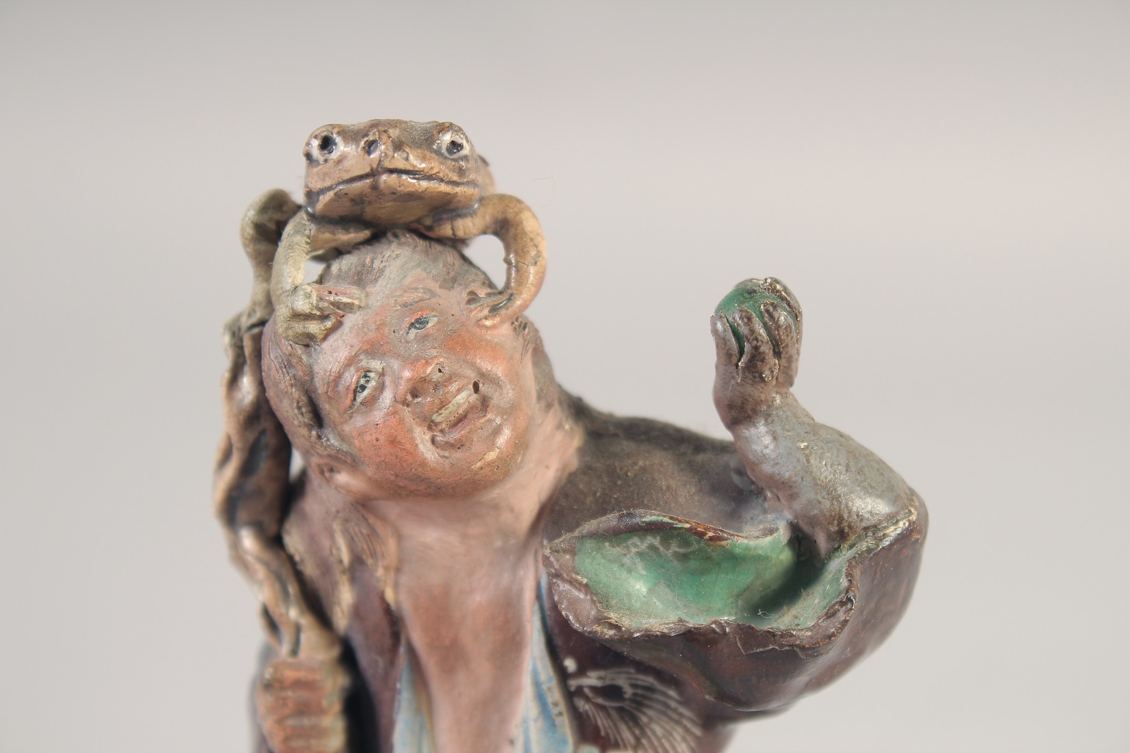 A PAINTED TERRACOTTA FIGURE OF A SENNIN and his three-legged toad, 16.5cm high. - Image 5 of 7