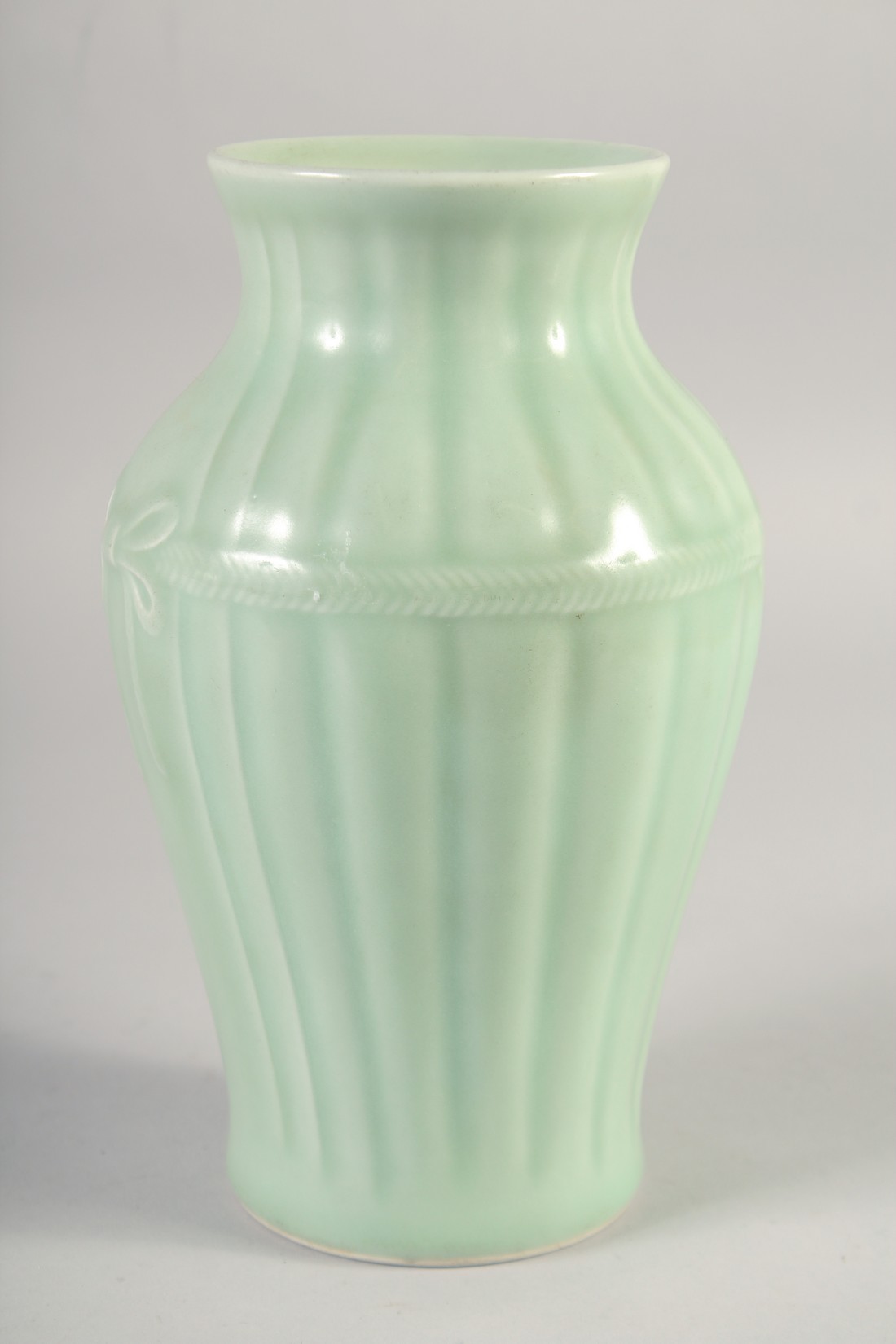 A CHINESE CELADON GLAZE PORCELAIN VASE, with six-character mark to base, 23cm high. - Image 2 of 5