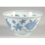 A CHINESE BLUE AND WHITE PORCELAIN CUP, six-character mark to base, 8cm diameter.