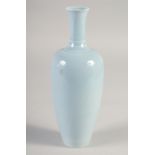 A CHINESE POWDER BLUE VASE, six-character mark to base, 21cm high.