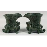 A LARGE AND IMPRESSIVE PAIR OF HEAVY CHINESE CARVED GREEN SOAPSTONE VASES, the upper vessel carved