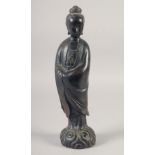 A CHINESE BRONZE FIGURE OF GUANYAN, bearing character mark, 32cm high.