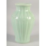 A CHINESE CELADON GLAZE PORCELAIN VASE, with six-character mark to base, 23cm high.