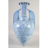 A LATE 19TH CENTURY SPANISH BLUE AND WHITE PORCELAIN ALHAMBRA VASE, painted with various
