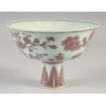 A CHINESE UNDER GLAZE RED PORCELAIN STEM BOWL, the interior with six-character mark, bowl 17cm