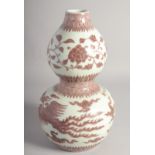 A CHINESE UNDERGLAZE RED AND WHITE DOUBLE GOURD VASE, decorated with phoenix, six-character mark,