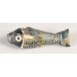 A RARE EARLY ISLAMIC -POSSIBLY MAMLUK MARVERED GLASS FISH, 7cm long.