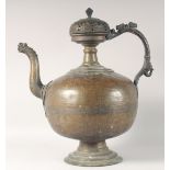 A LARGE 17TH CENTURY INDIAN BRONZE EWER, with zoomorphic handle and spout, 55cm high.