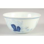 A CHINESE BLUE AND WHITE CHICKEN CUP, six-character mark to base, 8cm diameter.