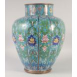 A LARGE CHINESE BLUE GROUND CLOSONNE VASE, decorated with floral motifs and precious objects, 41cm