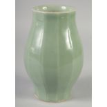 A CHINESE CELADON VASE, 20cm high.