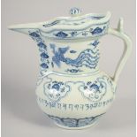 A CHINESE BLUE AND WHITE PORCELAIN LIDDED EWER, with lotus, phoenix and a band of characters, six-