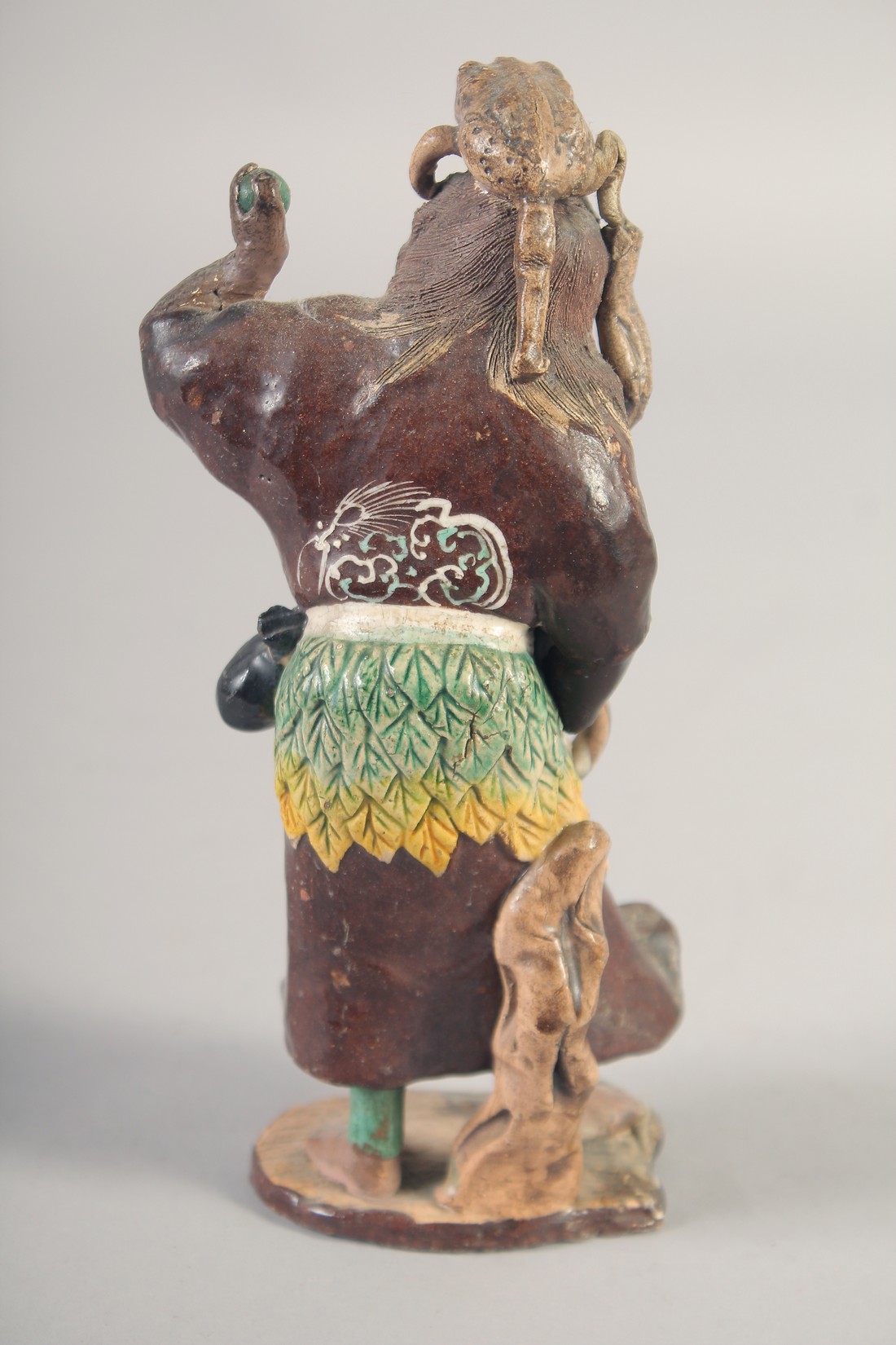 A PAINTED TERRACOTTA FIGURE OF A SENNIN and his three-legged toad, 16.5cm high. - Image 3 of 7