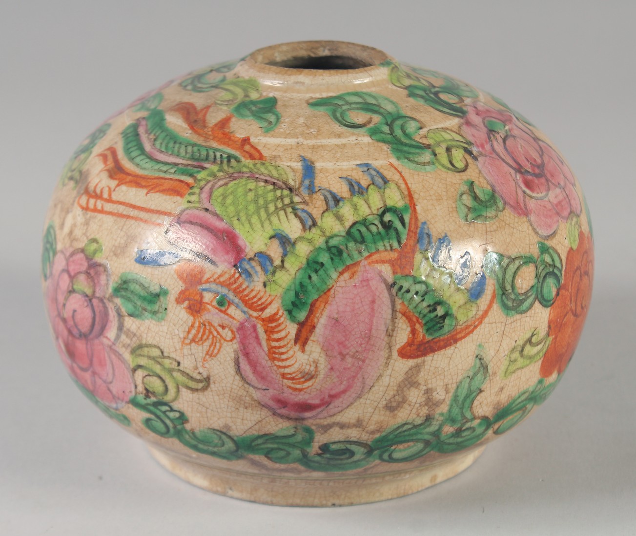 A 19TH CENTURY CHINESE FAMILLE ROSE JAR, possibly a vase lacking neck, (af), 16cm diameter.