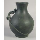 A CHINESE BRONZE VASE WITH RELIEF CHILONG, indistinct mark to base, 23cm high.