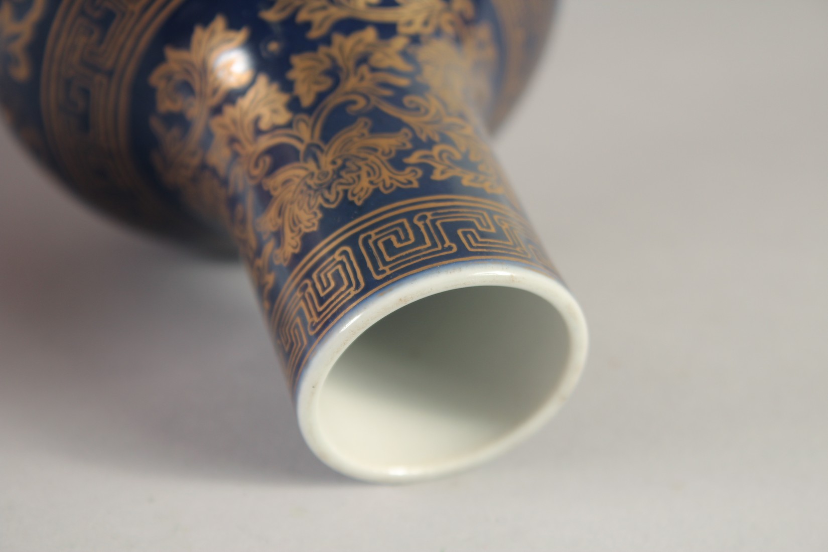 A CHINESE POWDER BLUE VASE, with gilt floral decoration, the base with six-character mark, 13cm - Image 4 of 5