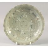 A 19TH CENTURY KOREAN DISH, decorated with cranes, 26cm diameter.