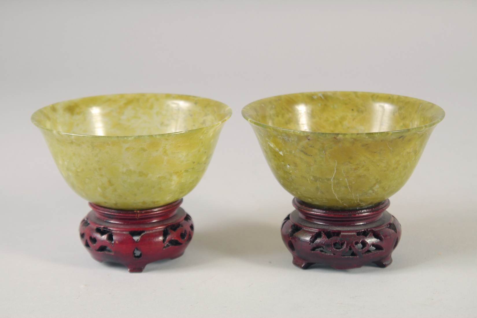 A PAIR OF JADE BOWLS, on hardwood stands, bowls 10cm diameter. - Image 2 of 5