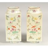 A PAIR OF CHINESE FAMILLE ROSE PORCELAIN SQUARE FORM VASES, painted all over with insects and flora,