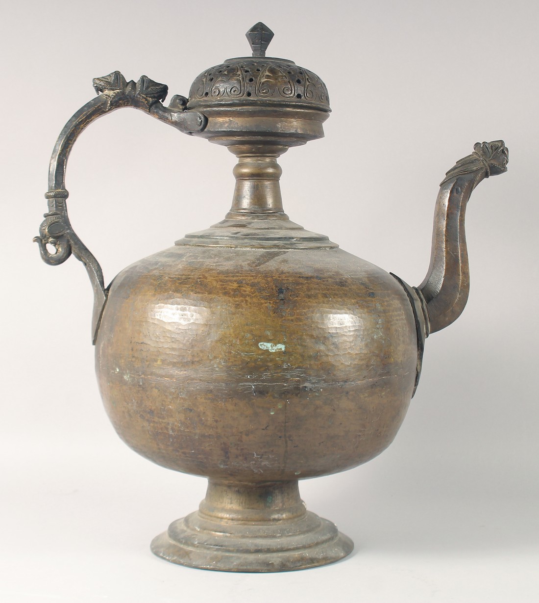 A LARGE 17TH CENTURY INDIAN BRONZE EWER, with zoomorphic handle and spout, 55cm high. - Image 3 of 9