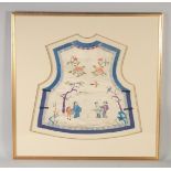 A 19TH CENTURY CHINESE CHILD'S WAISTCOAT, decorated with figures, framed and glazed, 65.5cm square.