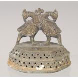 A 19TH CENTURY INDIAN BRASS FOOT SCRAPER, 8.5cm wide.