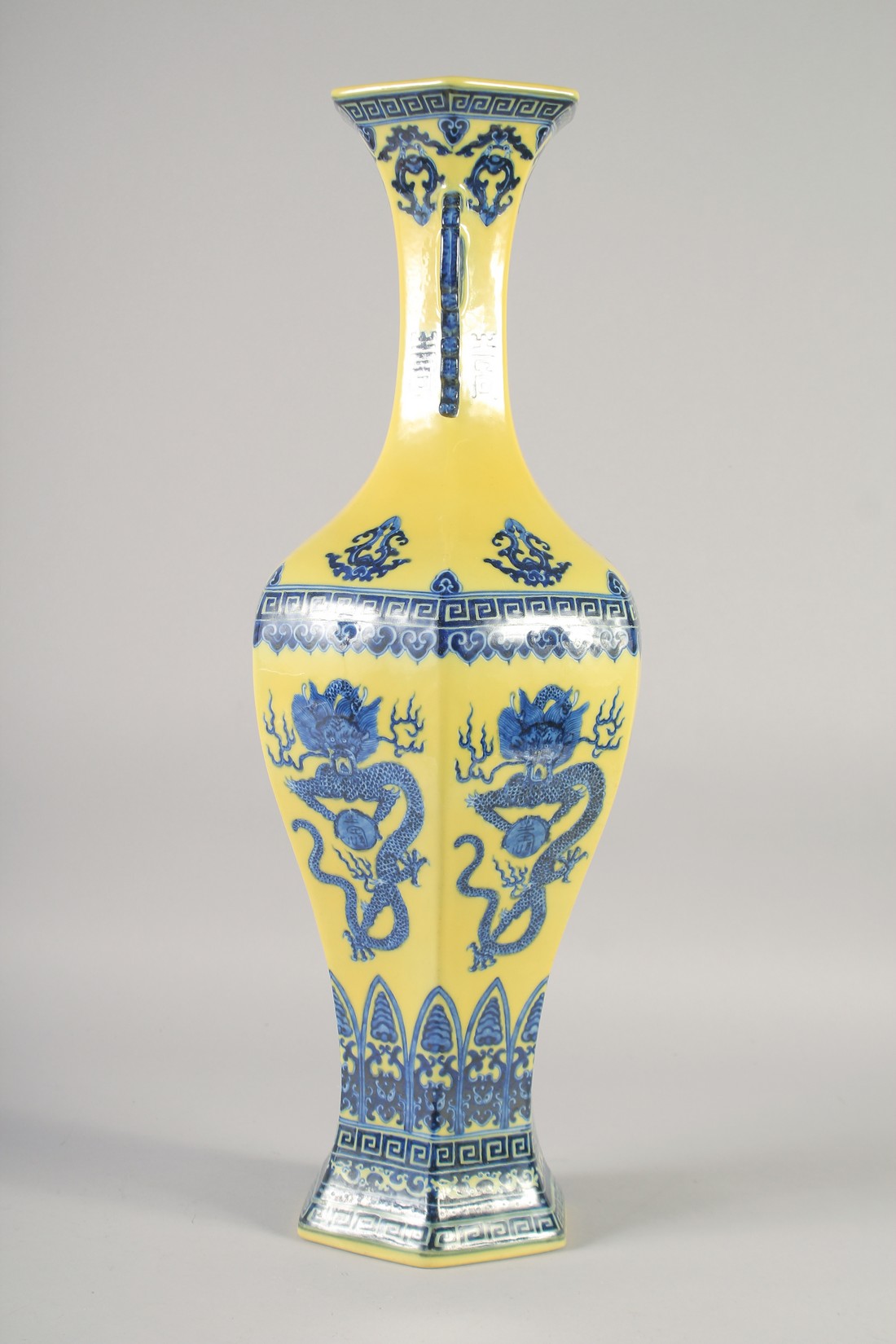 A LARGE CHINESE YELLOW GROUND BLUE AND WHITE HEXAGONAL VASE, with molded twin handles, 58cm high. - Image 2 of 6