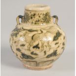 A THAI GLAZED POTTERY VASE, painted with beasts, 13.5cm high.