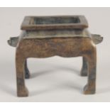 A GOOD CHINESE CENSER on four legs. 4ins high.