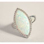 A SILVER GILSON OPAL RING.