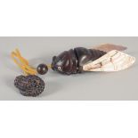 A JAPANESE CARVED WOOD AND MOTHER OF PEARL DRAGON FLY INRO. Signed with toggle. 4.5ins long.