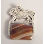 A SILVER AND AGATE LION FOB SEAL.