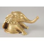 A GILT BRONZE ELEPHANT on a circular base. 6ins