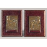 A. GUZMAN (1904 - 1943). ART DECO BRONZE MEDALS mounted on a leather nude Egyptian lady. Signed, 2.