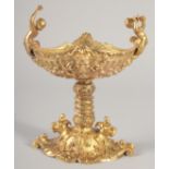 A GOOD GILT BRONZE CUPID PEDESTAL SALT.