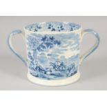 A STAFFORDSHIRE TWO HANDLED LOVING CUP printed with a farm scene