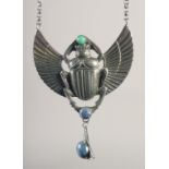 AN EGYPTIAN SCARAB LAPIS PENDANT AND CHAIN.