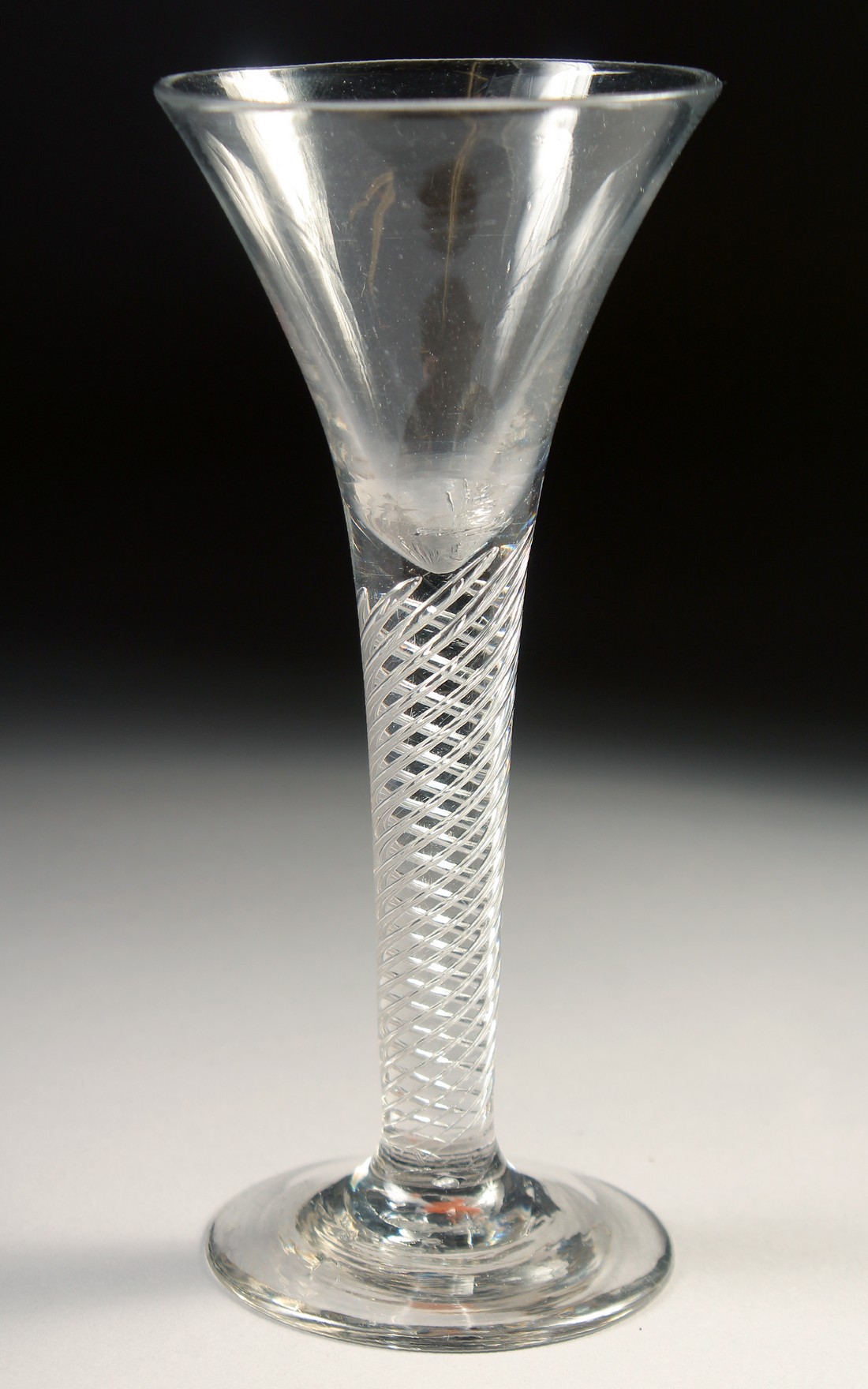 AN 18TH CENTURY TAPERING WINE GLASS with air twist stem. 6ins high. - Image 3 of 4