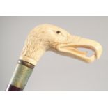 A WALKING STICK with carved bone handle "EAGLE".
