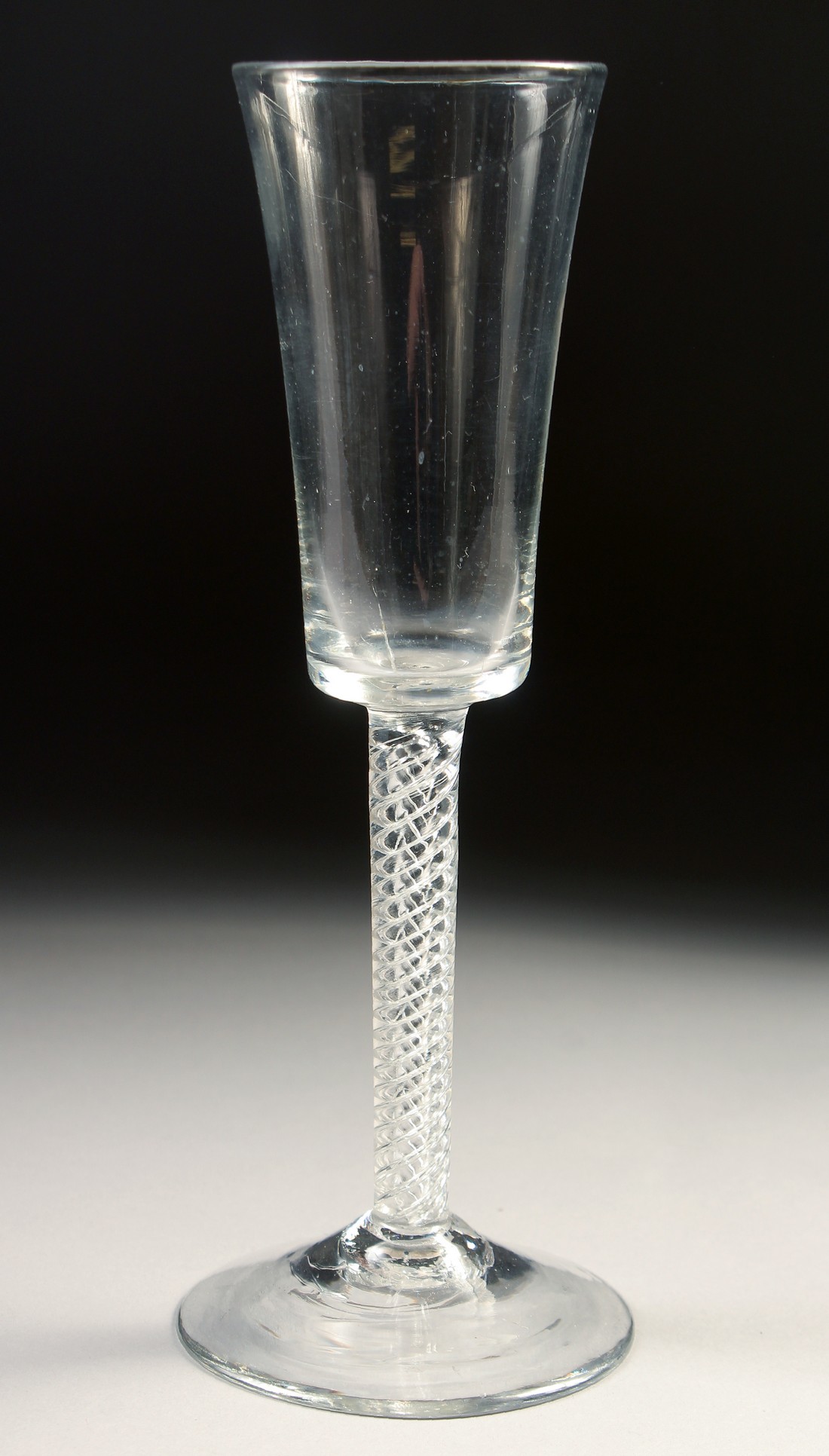 AN 18TH CENTURY TALL PLAIN ALE GLASS with air twist stem. 7.75ins high. - Image 3 of 4