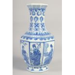 A CHINESE BLUE AND WHITE PORCELAIN HEXAGONAL VASE. 16ins high.