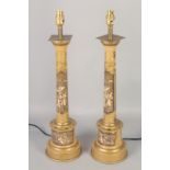 A PAIR OF GREEN TOLEWARE CHINESE DESIGN LAMPS. 24ins high.