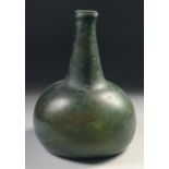 A MID 17TH CENTURY DUTCH GREEN GLASS ONION BOTTLE, deep painted base.