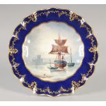 A ROYAL CROWN DERBY FINE SCALLOPED EDGE PLATE painted in colour with a ship at anchor and a castle