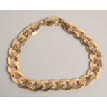 A 9CT GOLD BRACELET. 24gms.