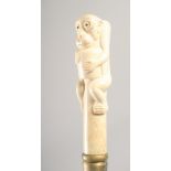 A WALKING STICK with carved bone handle "Monkey".