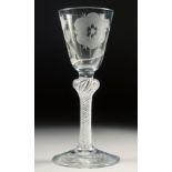 A GOOD JACOBEAN ROSE GLASS with air twist stem, the bowl engraved with a rose bud and leaves. 5.